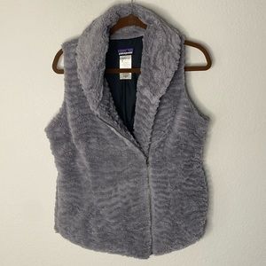 Patagonia gray faux fur vest. Asymmetrical zipper w cowl type collar. Size M